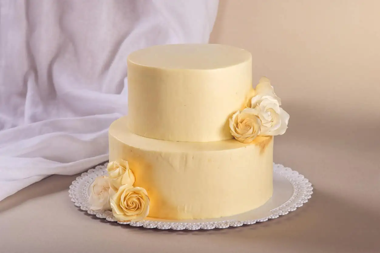 simple two tier wedding cake with all cream exterior