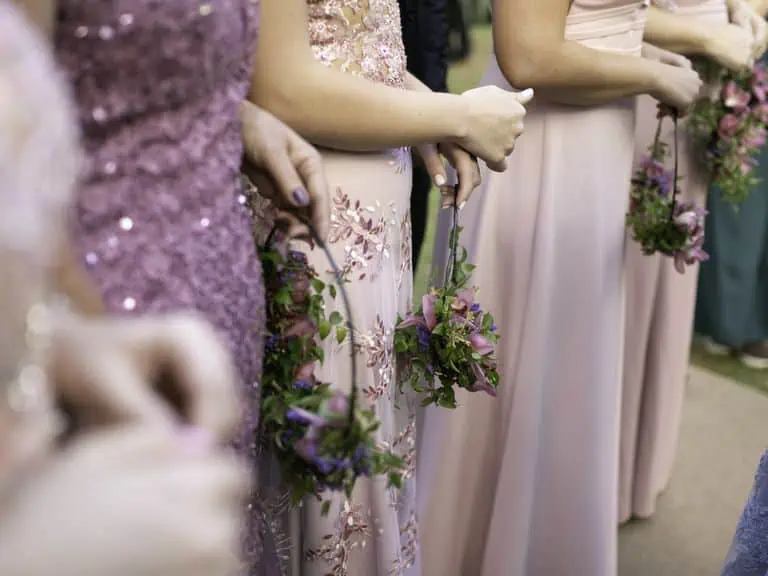 bridemaids holding flowers at a wedding